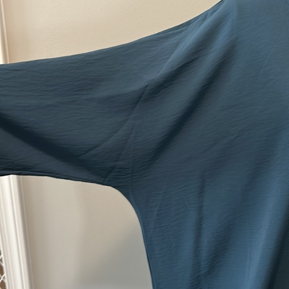 NWOT. Woman’s round neckline blouse with 3/4 length sleeves & ruffle hemline. - Picture 6 of 10